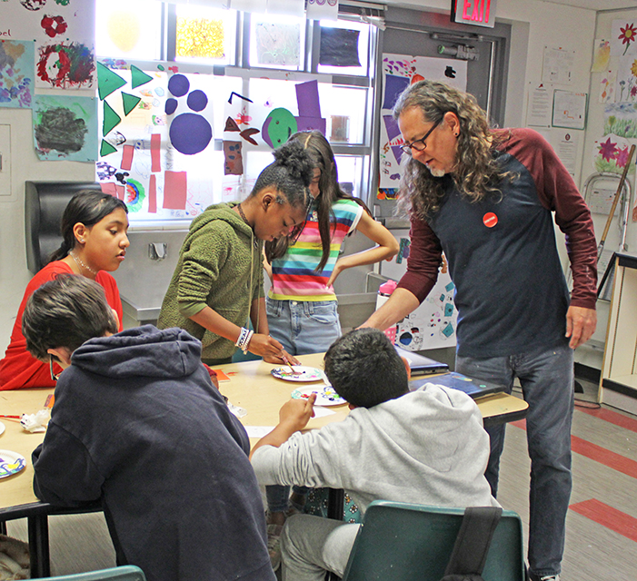 Oliverio Balcells work with students